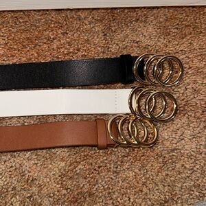 3 pack of belts. Brown, Black, and white! Brand new never used.